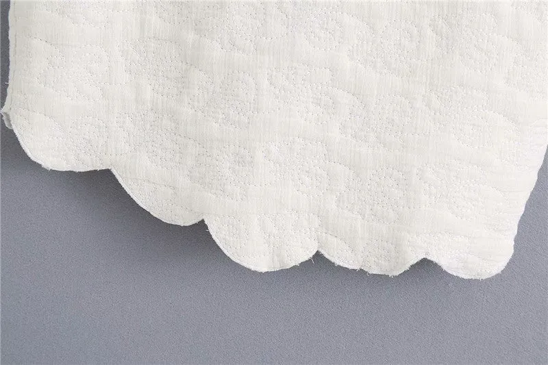 WAVY HEM QUILTED TOP