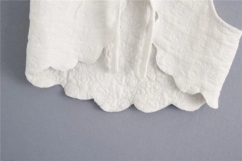 WAVY HEM QUILTED TOP