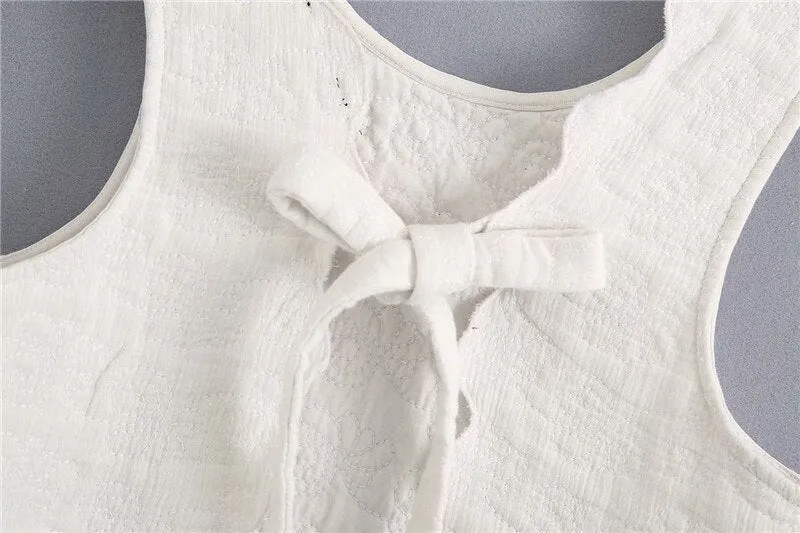 WAVY HEM QUILTED TOP